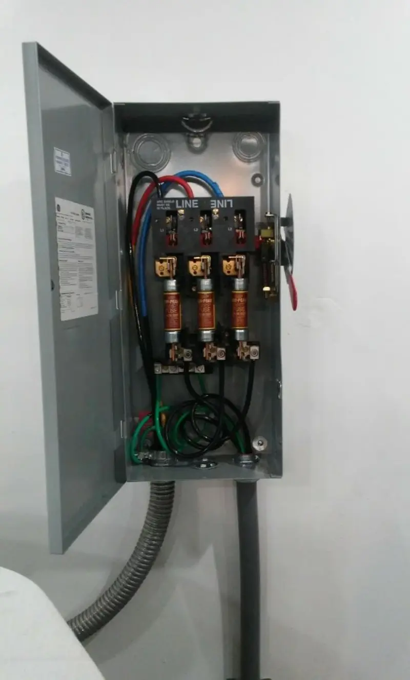 Three-phase disconnect switch installed for Smoke Detector Installation in Attica